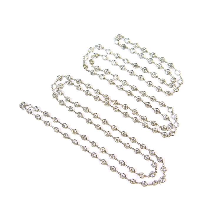 Antique platinum mounted spectacle set diamond chain